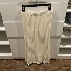 Midi white/ cream pleated sweater material skirt. Never worn